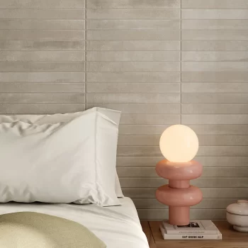 Rectangular greige tile featuring a non-rectified edge and matte finish, ideal for kitchens and bathrooms.