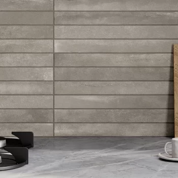 Rectangular 2x18 taupe tile, non-rectified edges, suitable for bathrooms and kitchens.