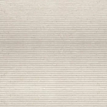 Light matte ceramic tile in Arles Light color with a limestone look, 13x39 inches.