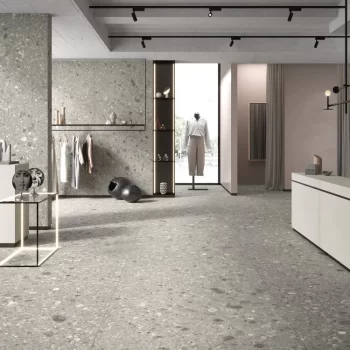 Large format rectified grey porcelain tile with a matte finish for wall applications.
