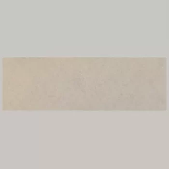 Large format 13x39mm matte ceramic tile in beige with limestone look, ideal for wall applications.