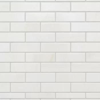 Glossy white subway look tiles in a 1/2x8 format, ideal for walls and backsplashes.